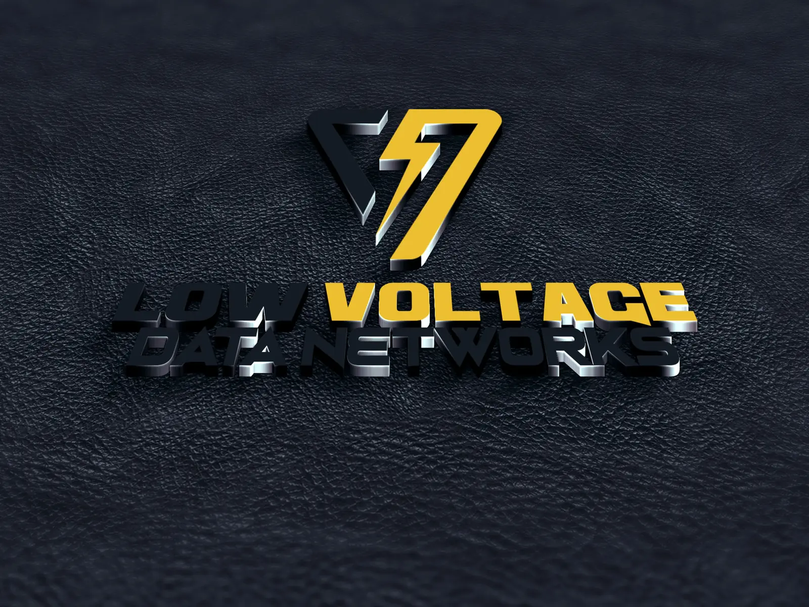 The Low Voltage Data Networks logo in gold 3D on black leather